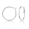 RG Bold and twisted hoop earrings, perfect for any look.